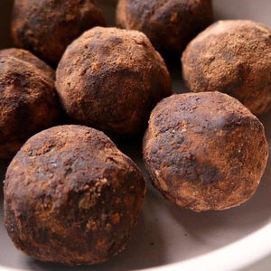 Dark Cocoa Dusted Date Bites